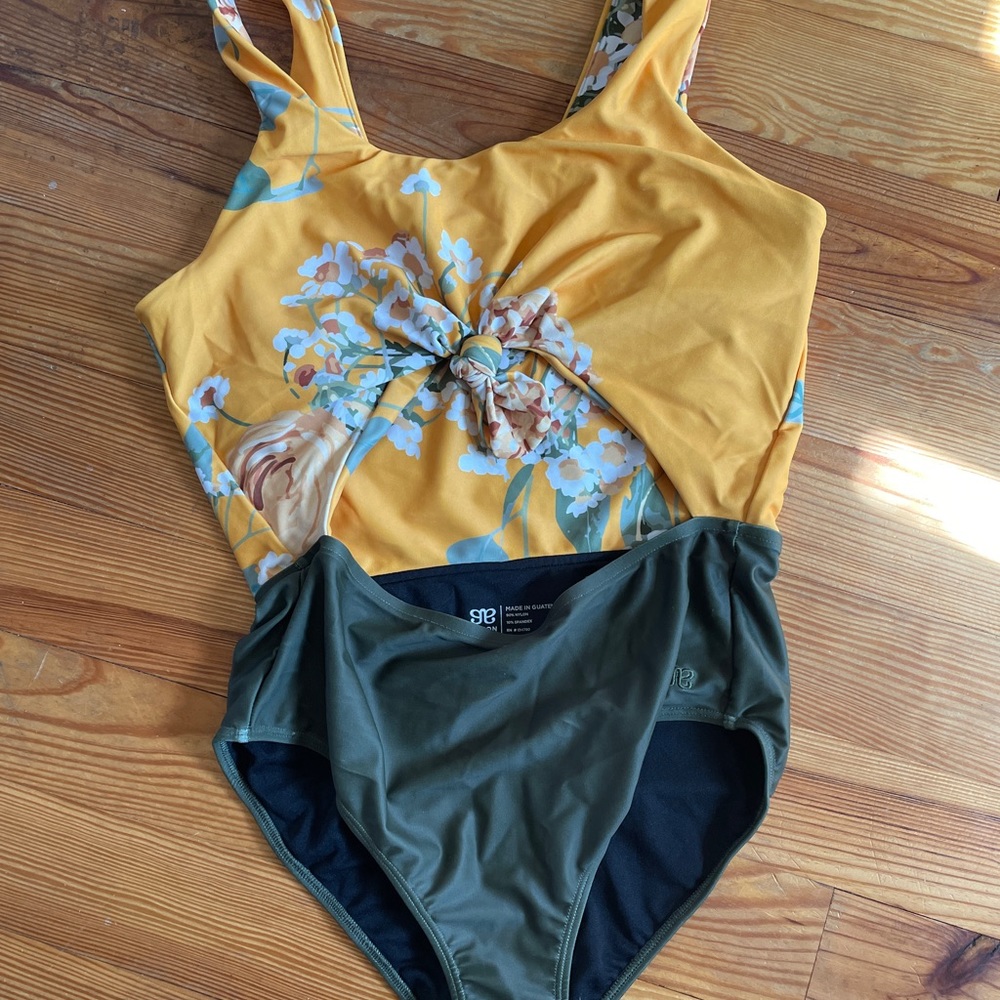 Albion Fit One Piece with Cut Out NWOT